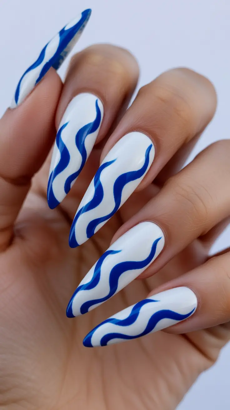 stiletto nails 2026 Graphic Blue Waves on White Stiletto Nails