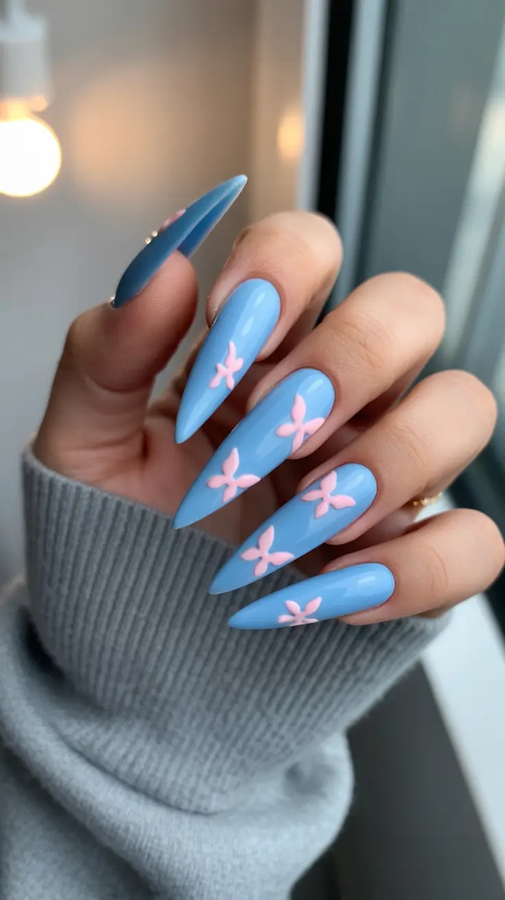 stiletto nails 2026 Sky Blue Stiletto Nails with Pink Bow Details